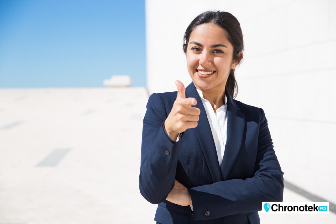 happy manager who uses automated time clock system to eliminate employee time theft