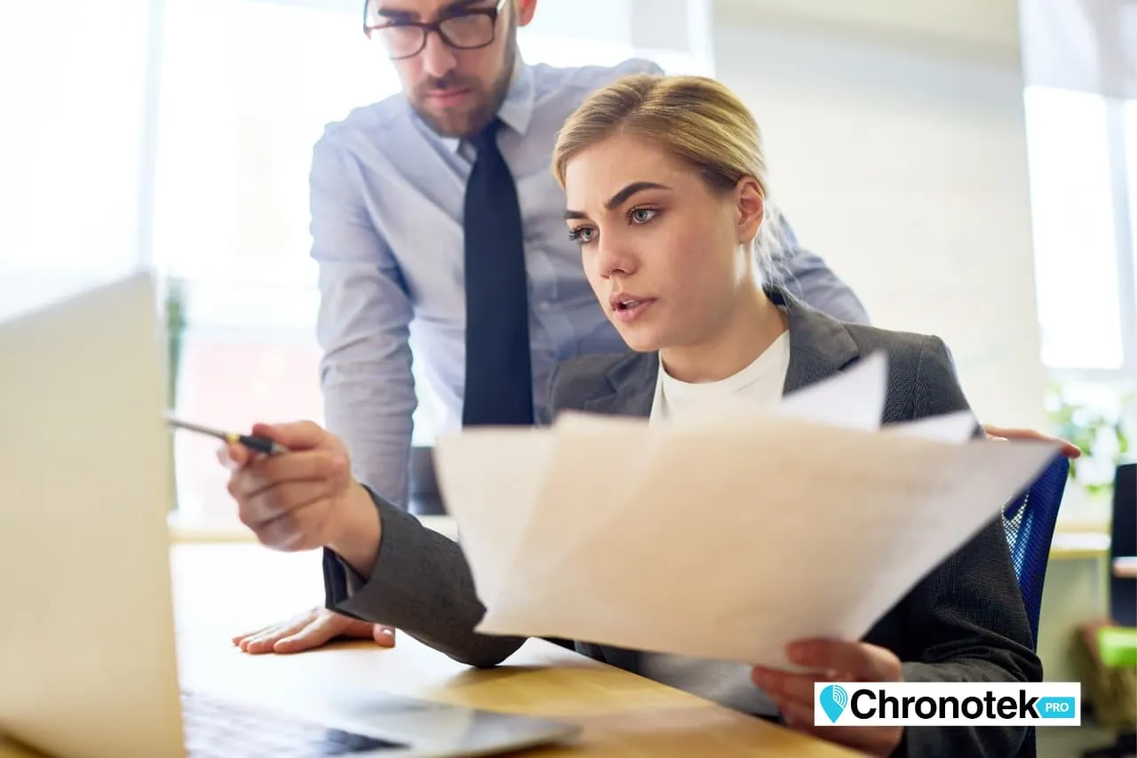 a business owner tracking labor costs with time tracking software