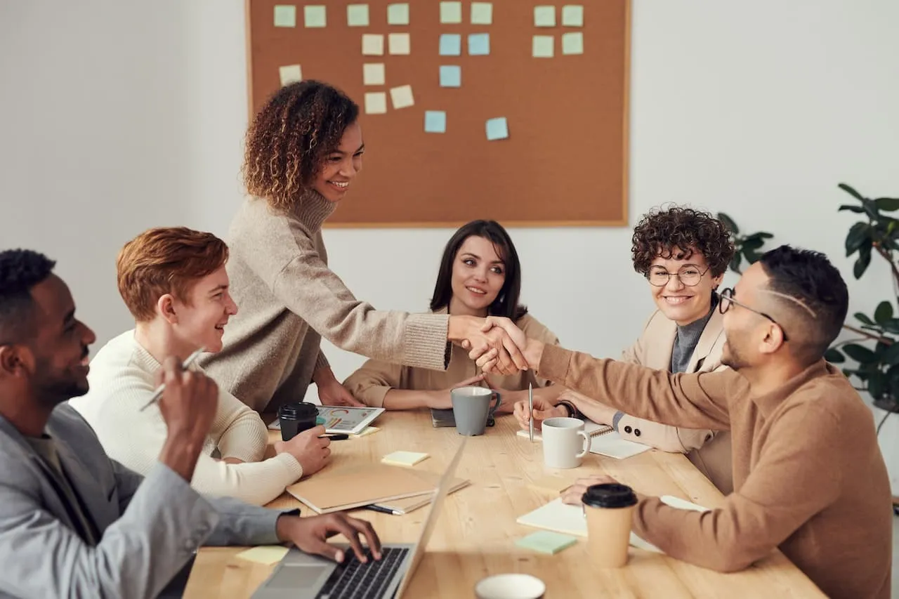 Group of diverse employees discussing employee engagement activities