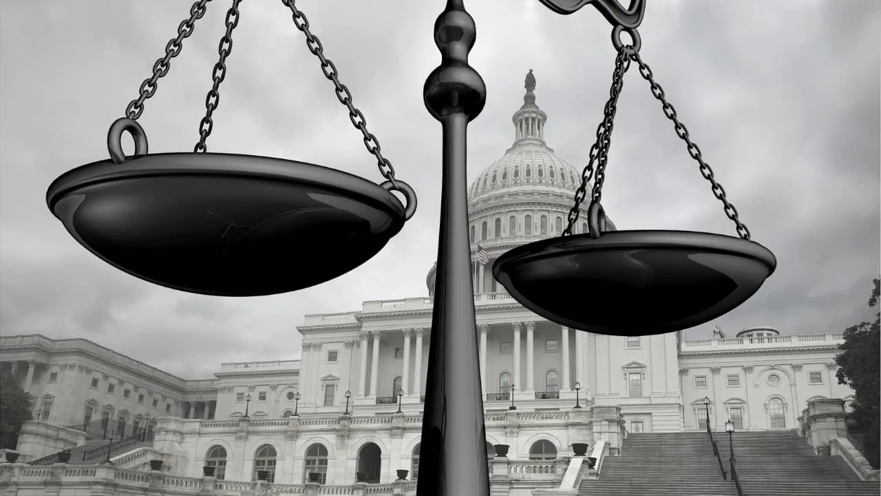 scales of justice in front of White House