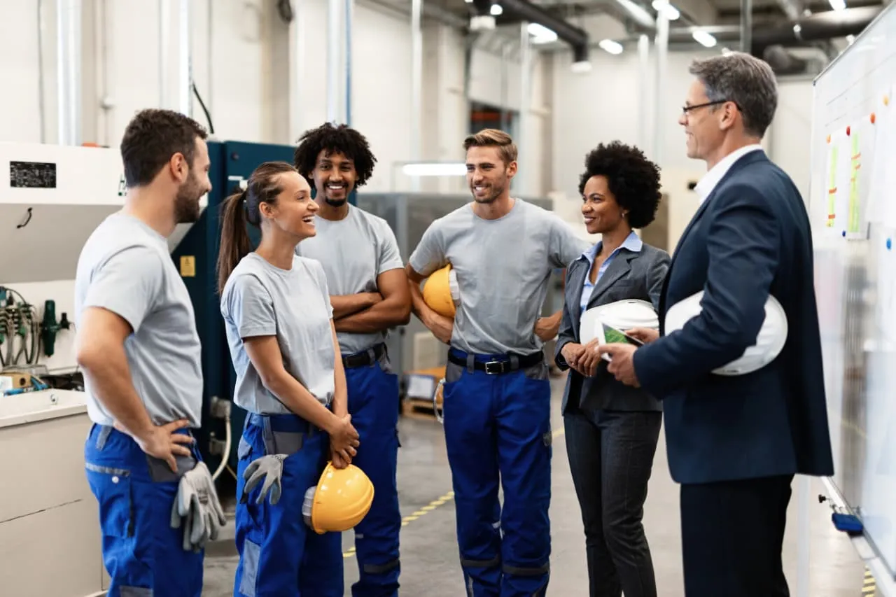 Employees discussing tips for continuous improvement of employee referral program