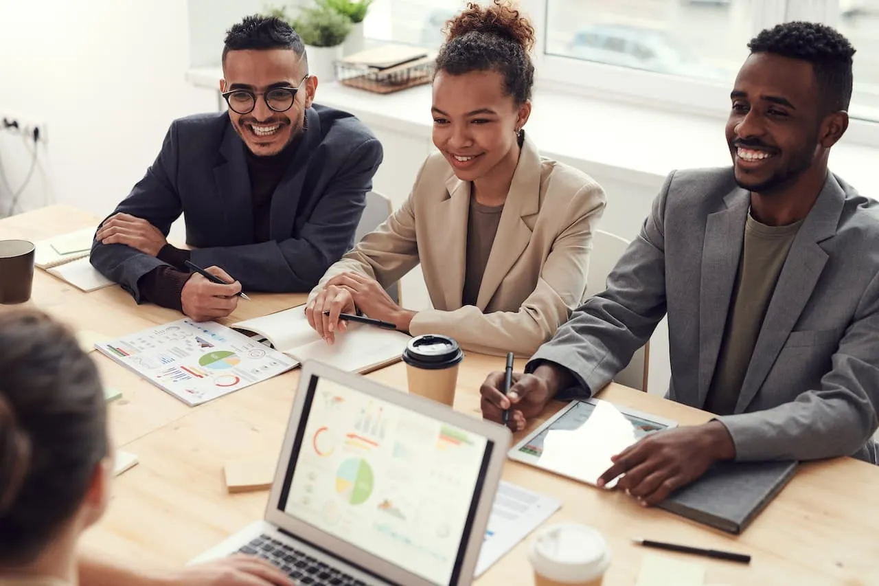 Group of diverse employees brainstorming innovative employee retention strategies