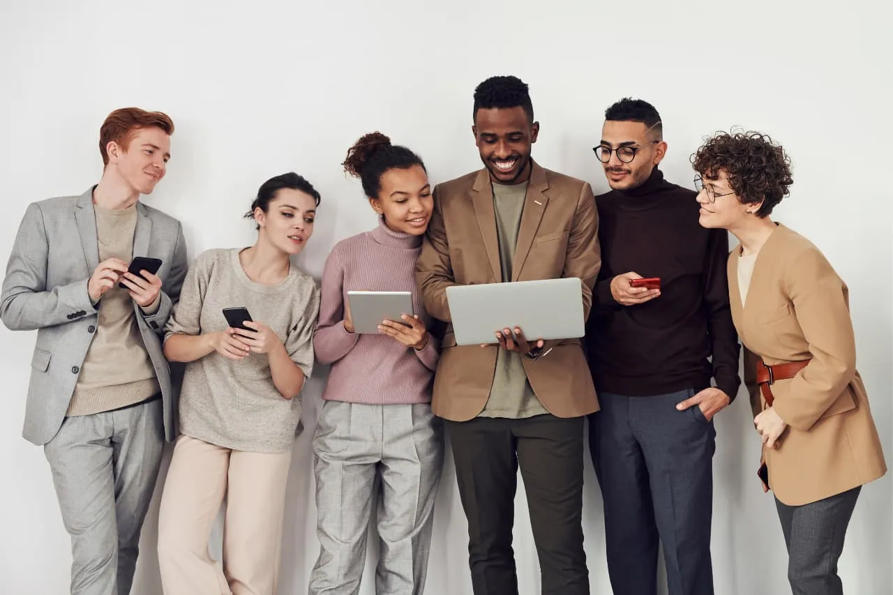 Employees discussing advantages of employee referral program