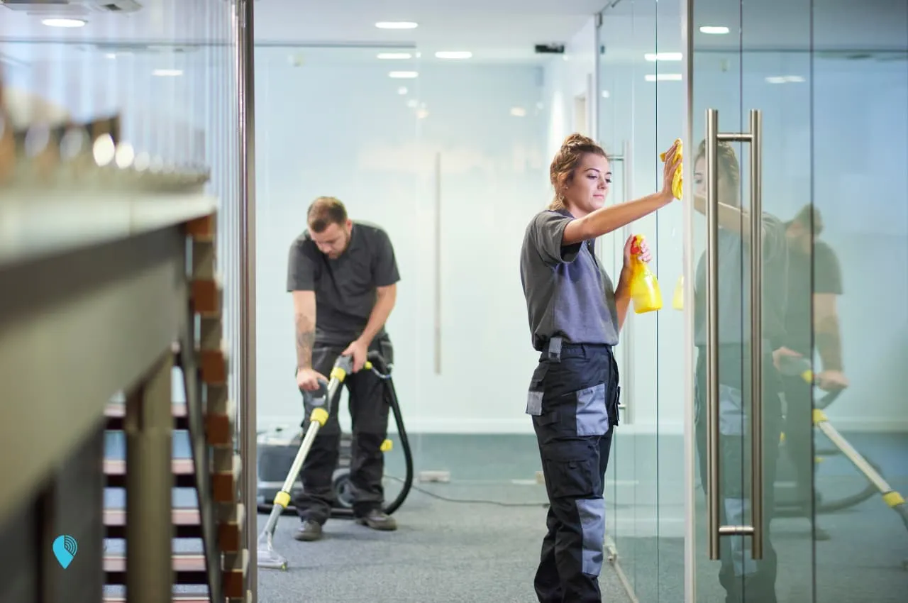 cleaning business employee doing carpet cleaning