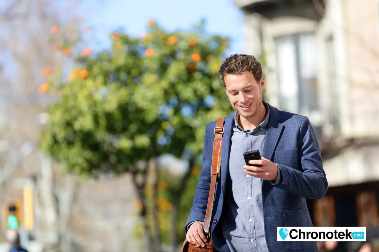 A manager using a time tracking app to equip his teams with integrated communication