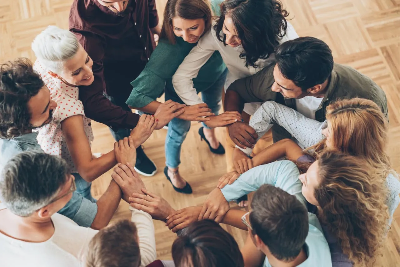 Group of people discussing employee referral program